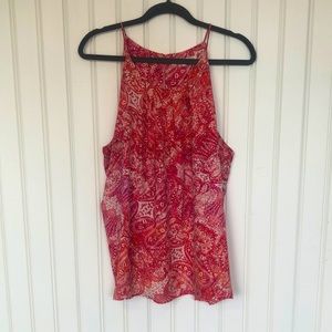 Pink patterned sleeveless blouse